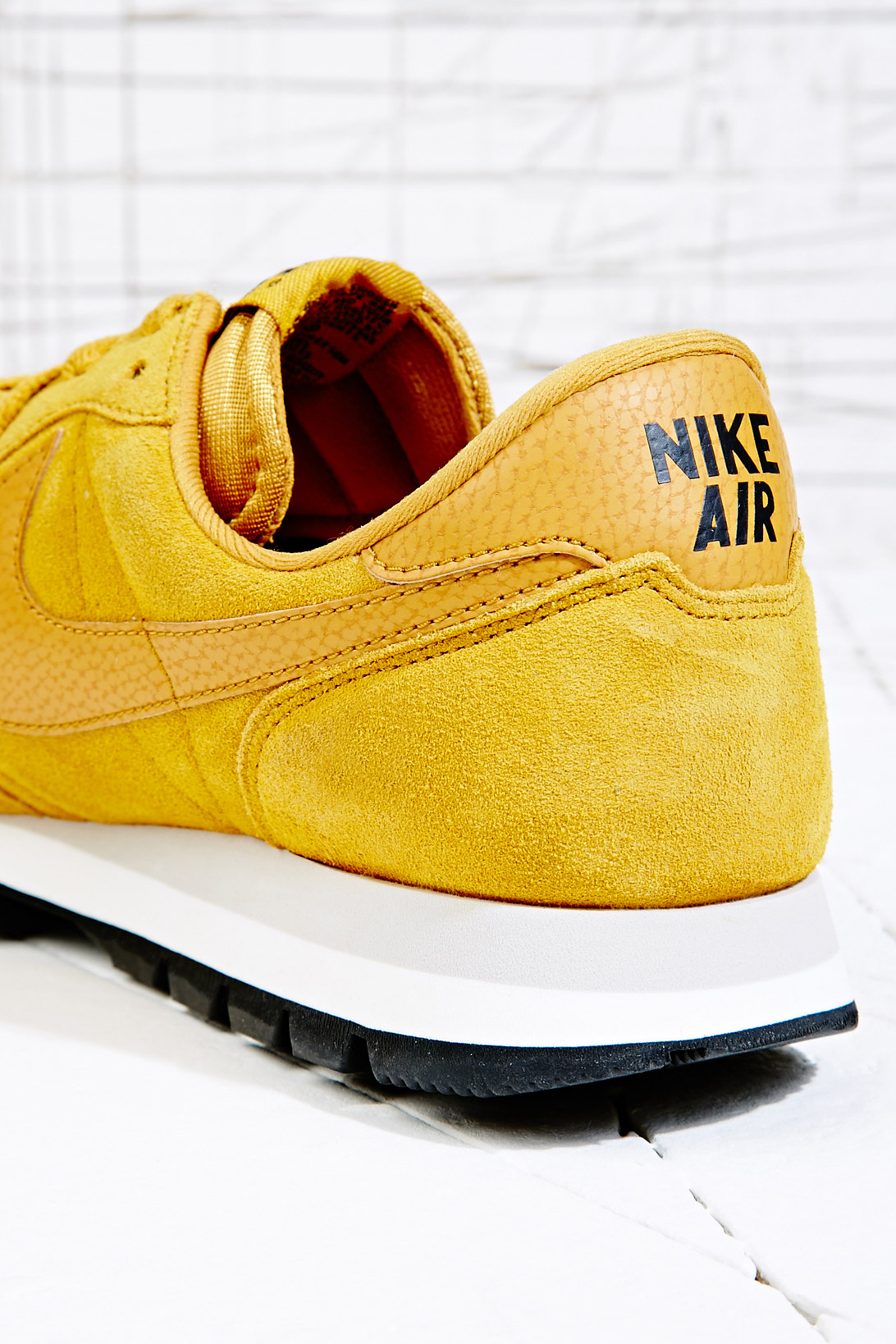 nike yellow suede trainers