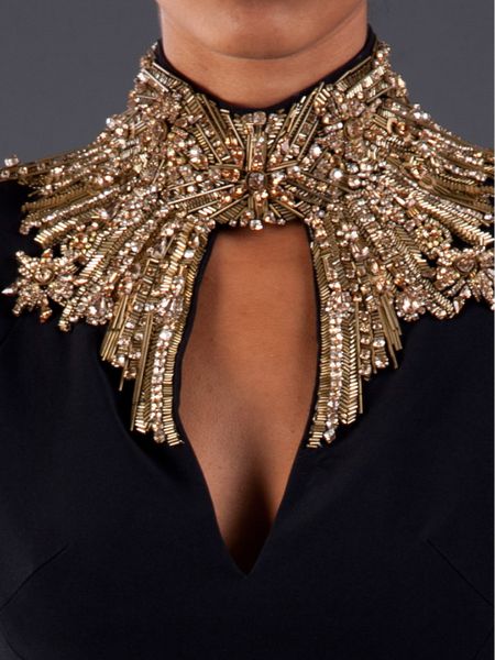 http://cdna.lystit.com/photos/2013/08/28/alexander-mcqueen-black-embellished-high-neck-gown-product-5-13020718-227316859_large_flex.jpeg