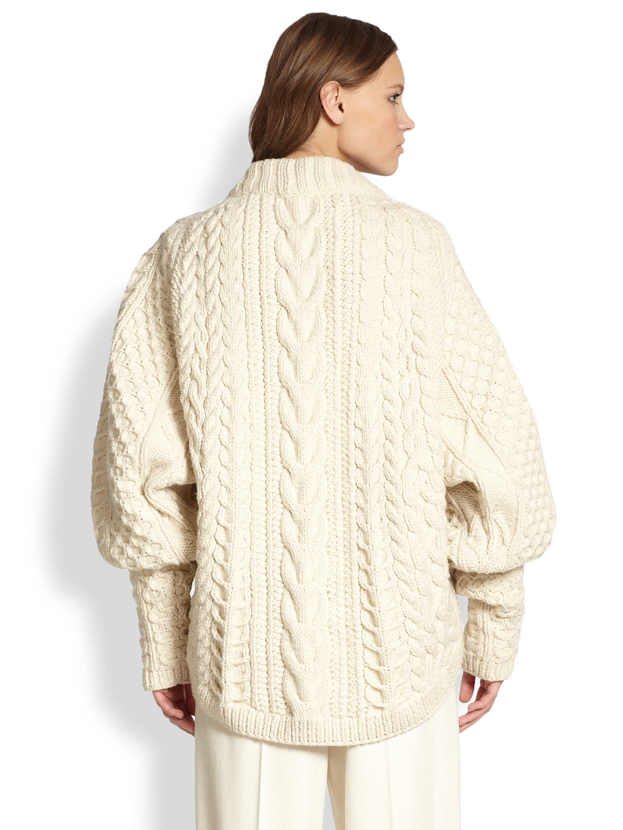 the row cable knit sweater