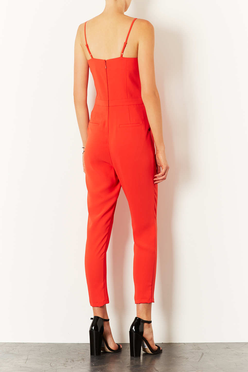 red orange jumpsuit