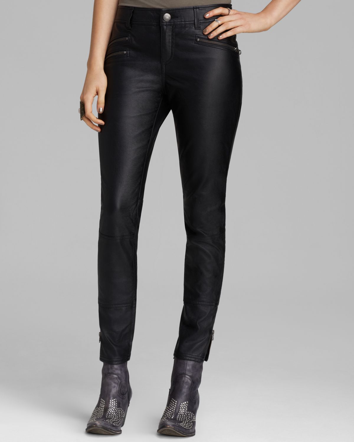 black faux leather skinny pants