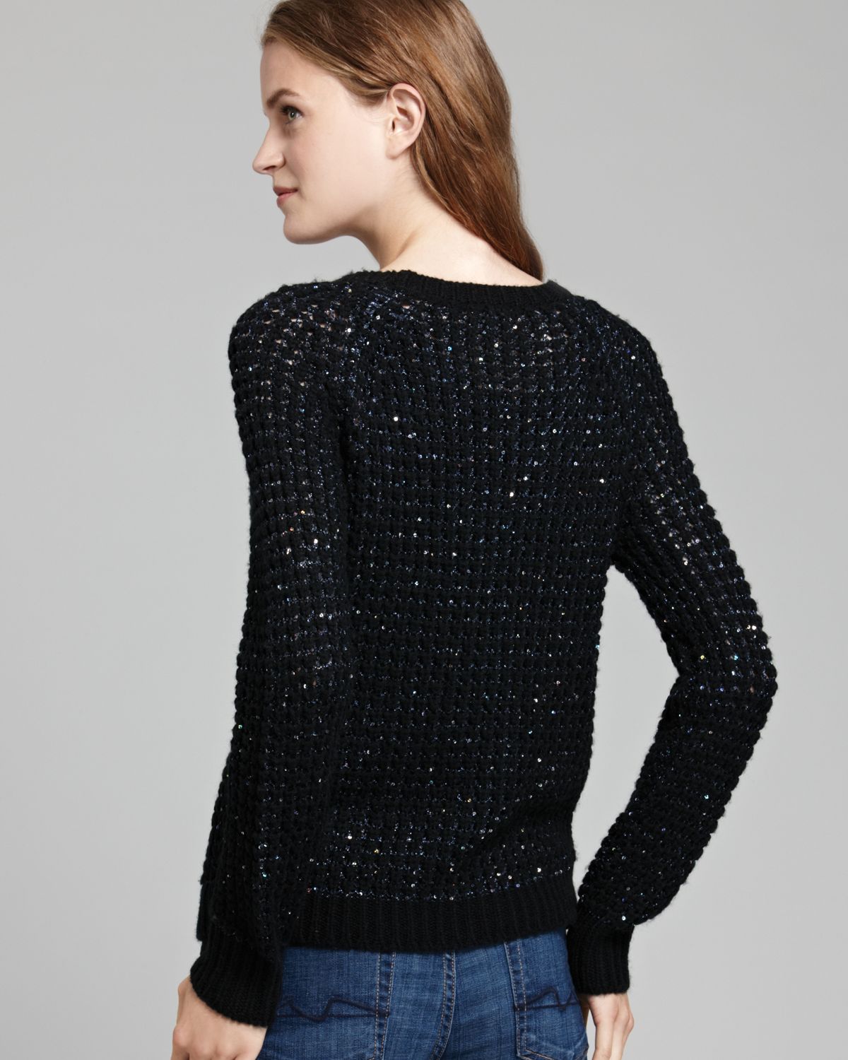 black metallic sweater