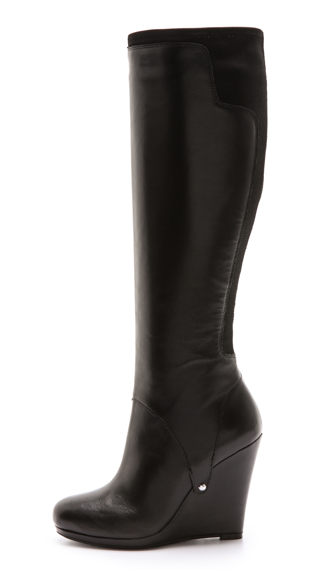 DKNY Nadia Stretch Back Wedge Boots in Black - Lyst