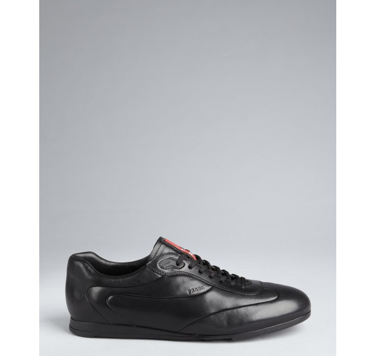 low profile black sneakers