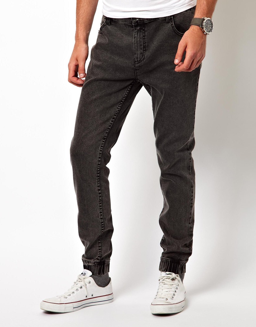 cuffed black skinny jeans
