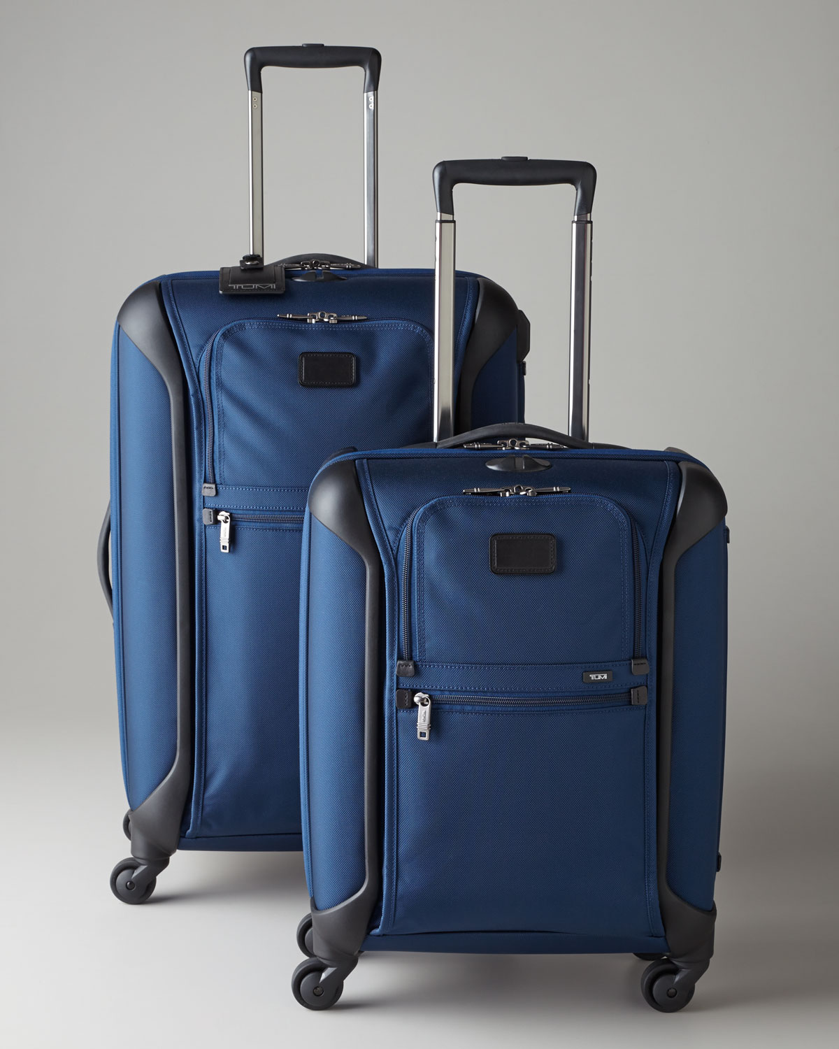 tumi blue luggage