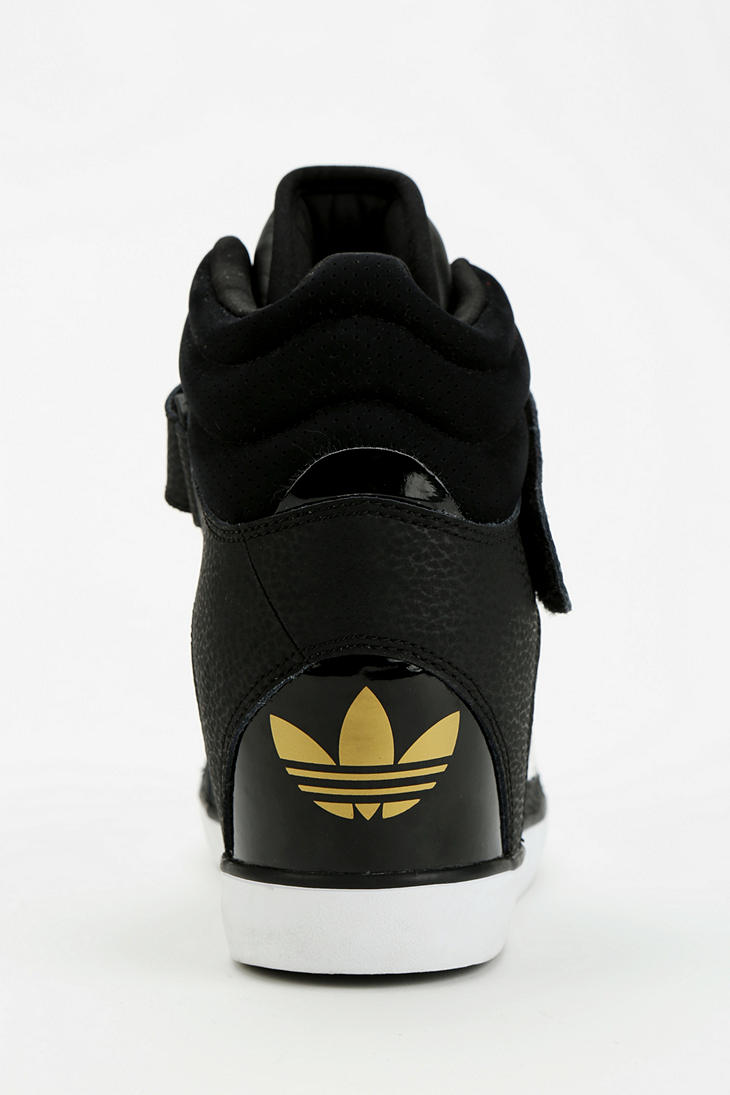 Urban Outfitters Adidas Amberlight Hidden Wedge Hightop Sneaker in Black |  Lyst