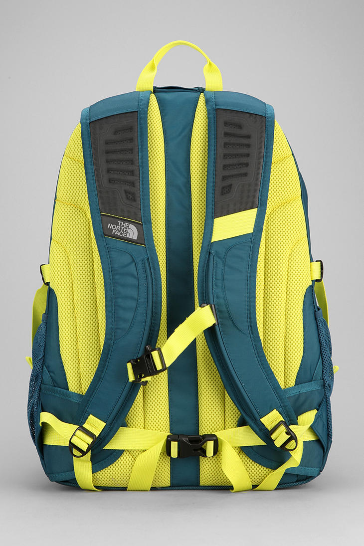 Green and yellow north face backpack on sale