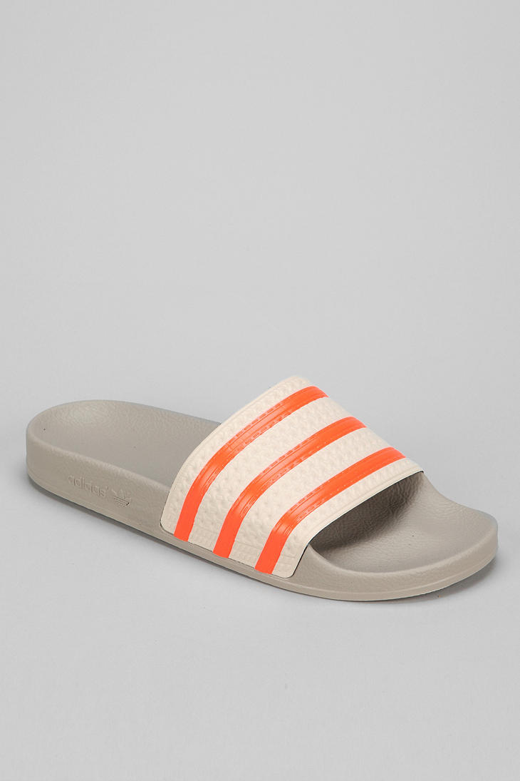 adilette slides orange
