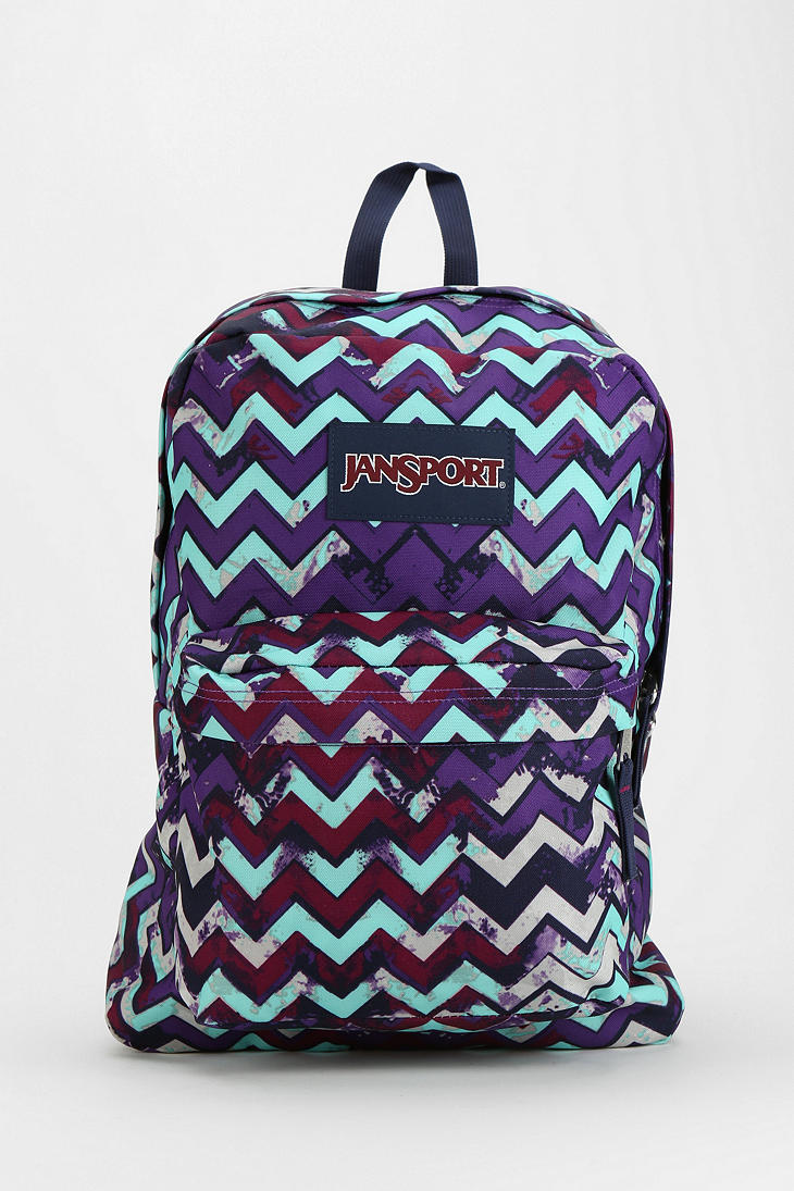 Lyst Urban Outfitters Jansport Zigzag Splatter Backpack in Purple