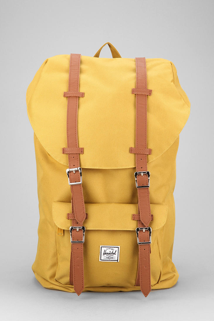 Urban outfitters Herschel Supply Co Little America Backpack in Yellow ...