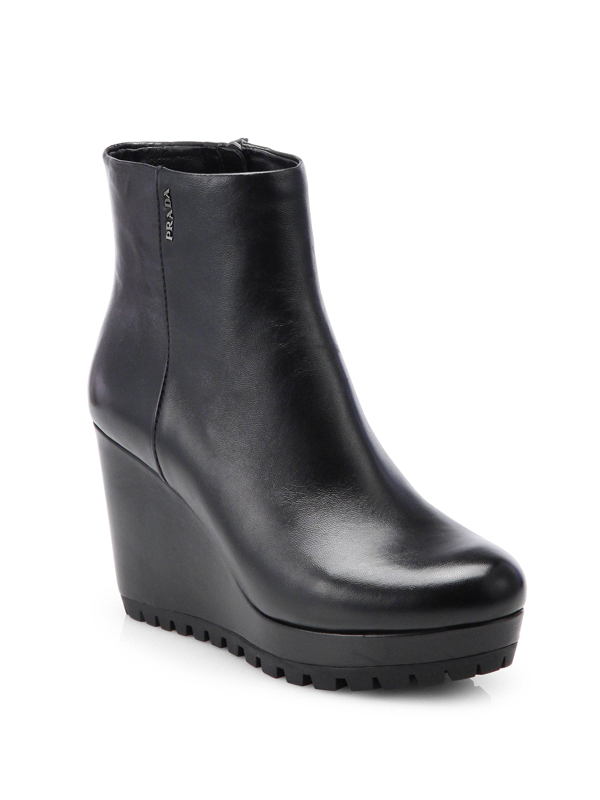 Prada Leather Wedge Ankle Boots in Black - Lyst