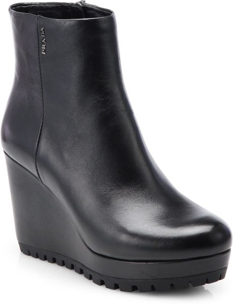 Prada Leather Wedge Ankle Boots in Black | Lyst