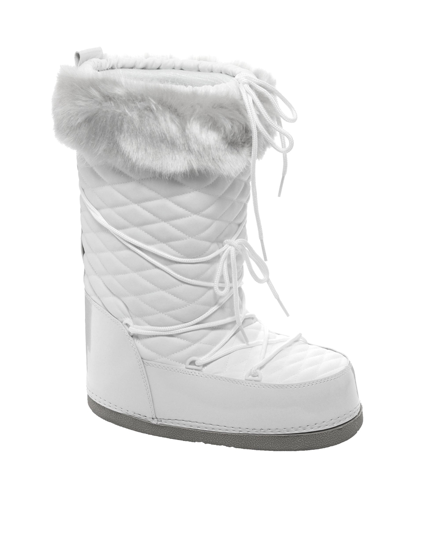 white fluffy snow boots