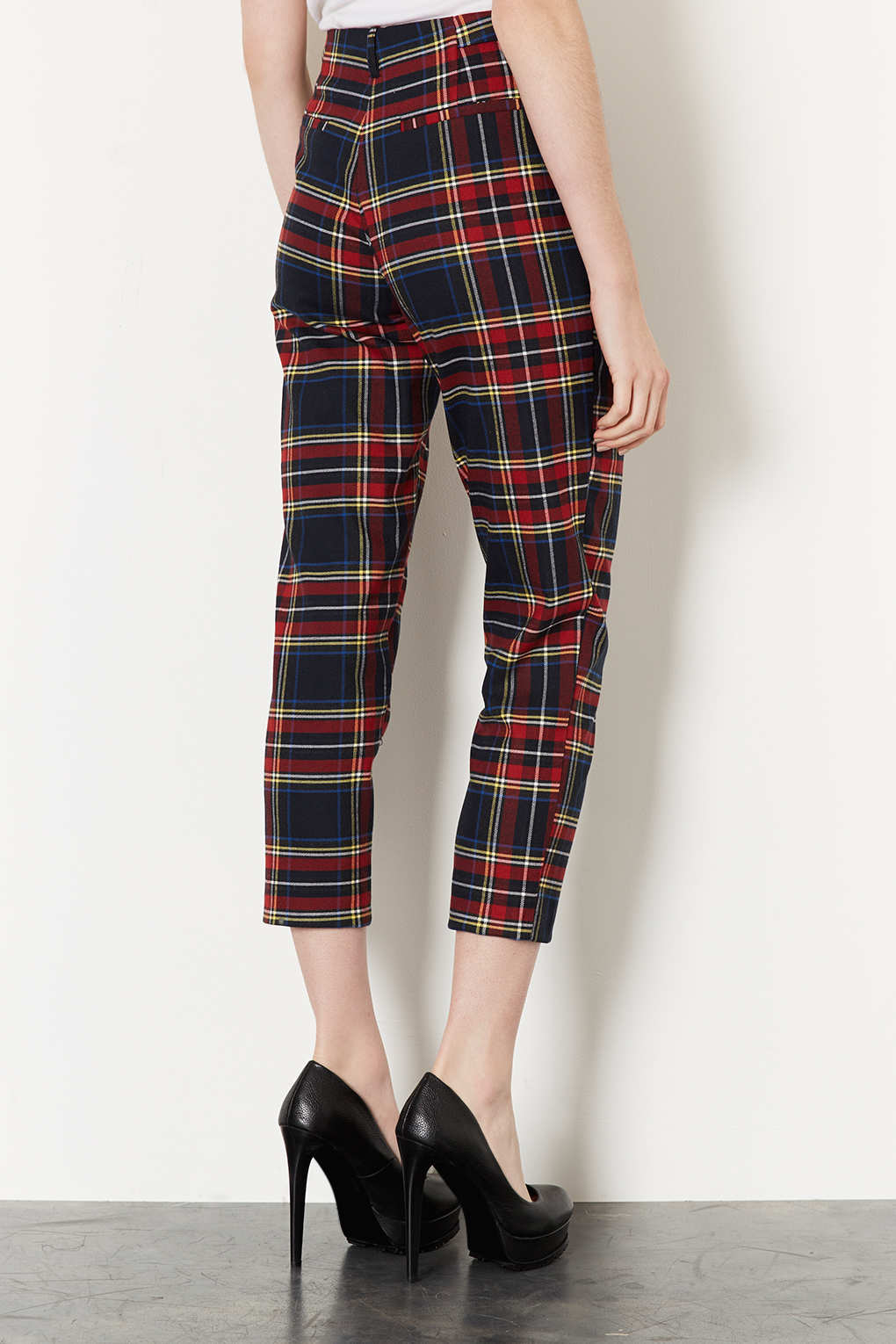 red and black check trousers
