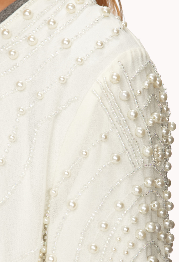 white beaded jacket