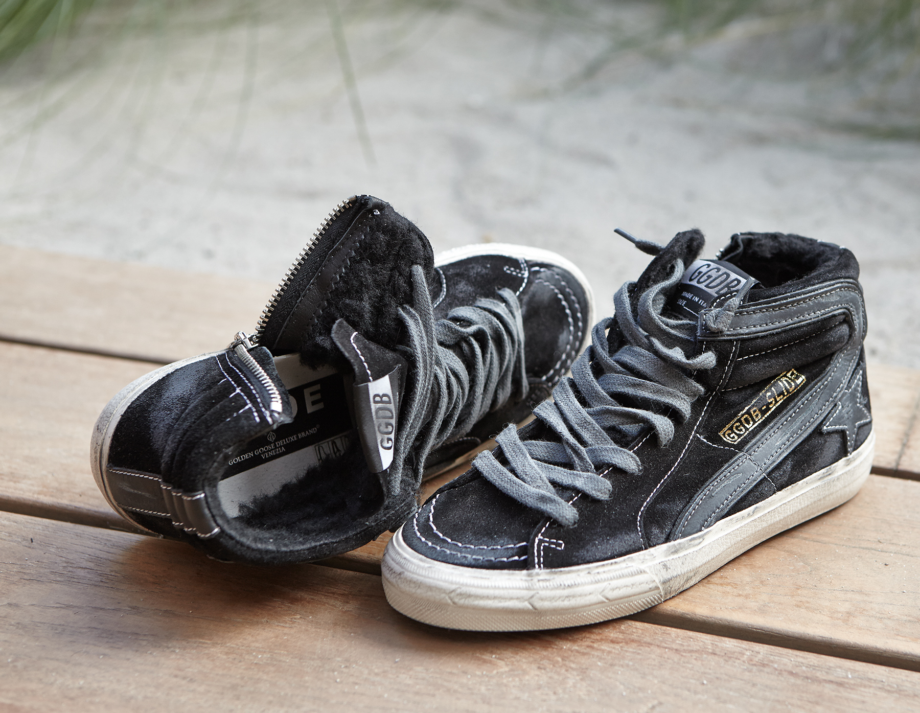 golden goose black high top sneakers