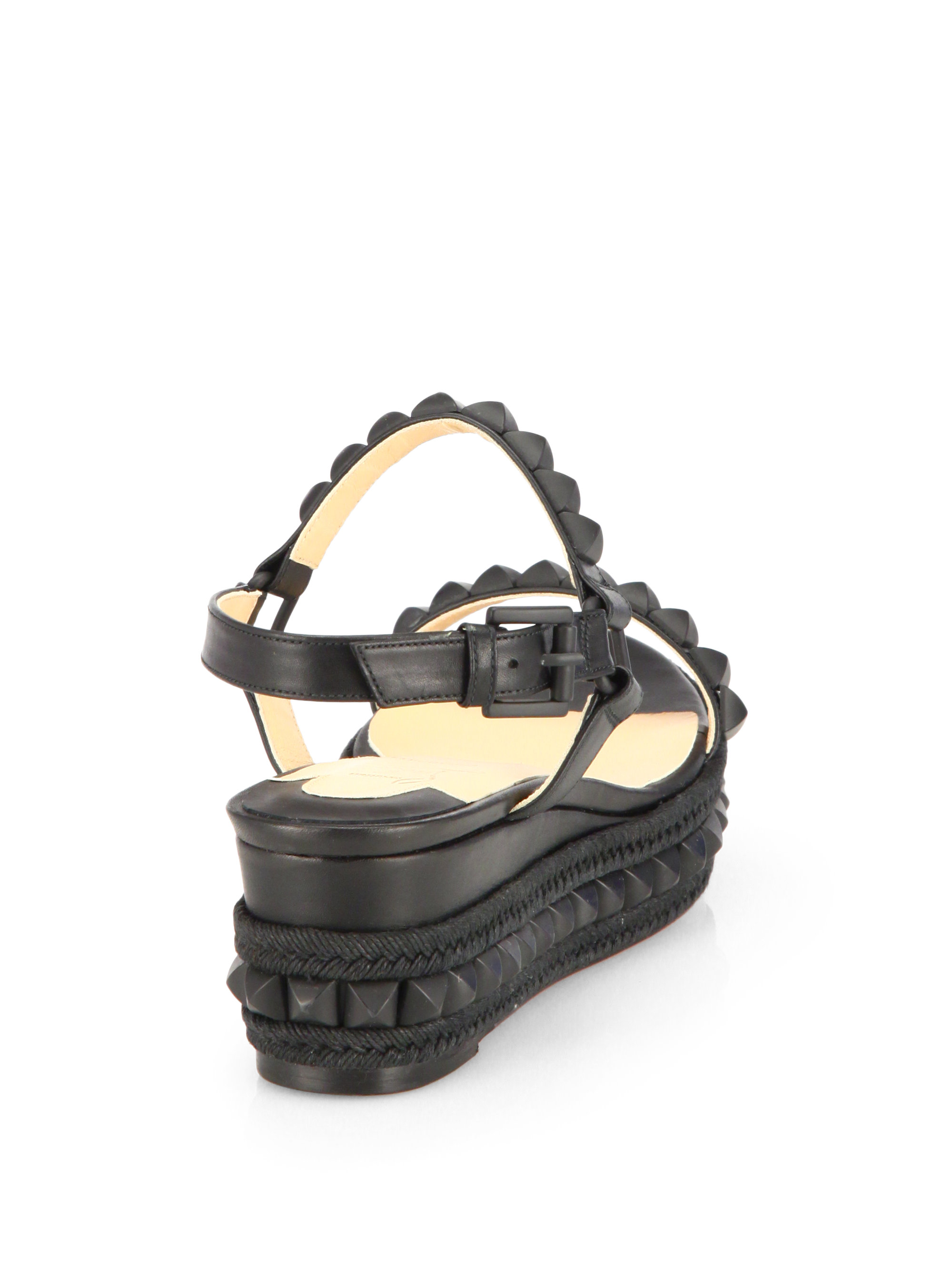 Christian Louboutin Cataclou Studded Wedge Sandals in Black - Lyst