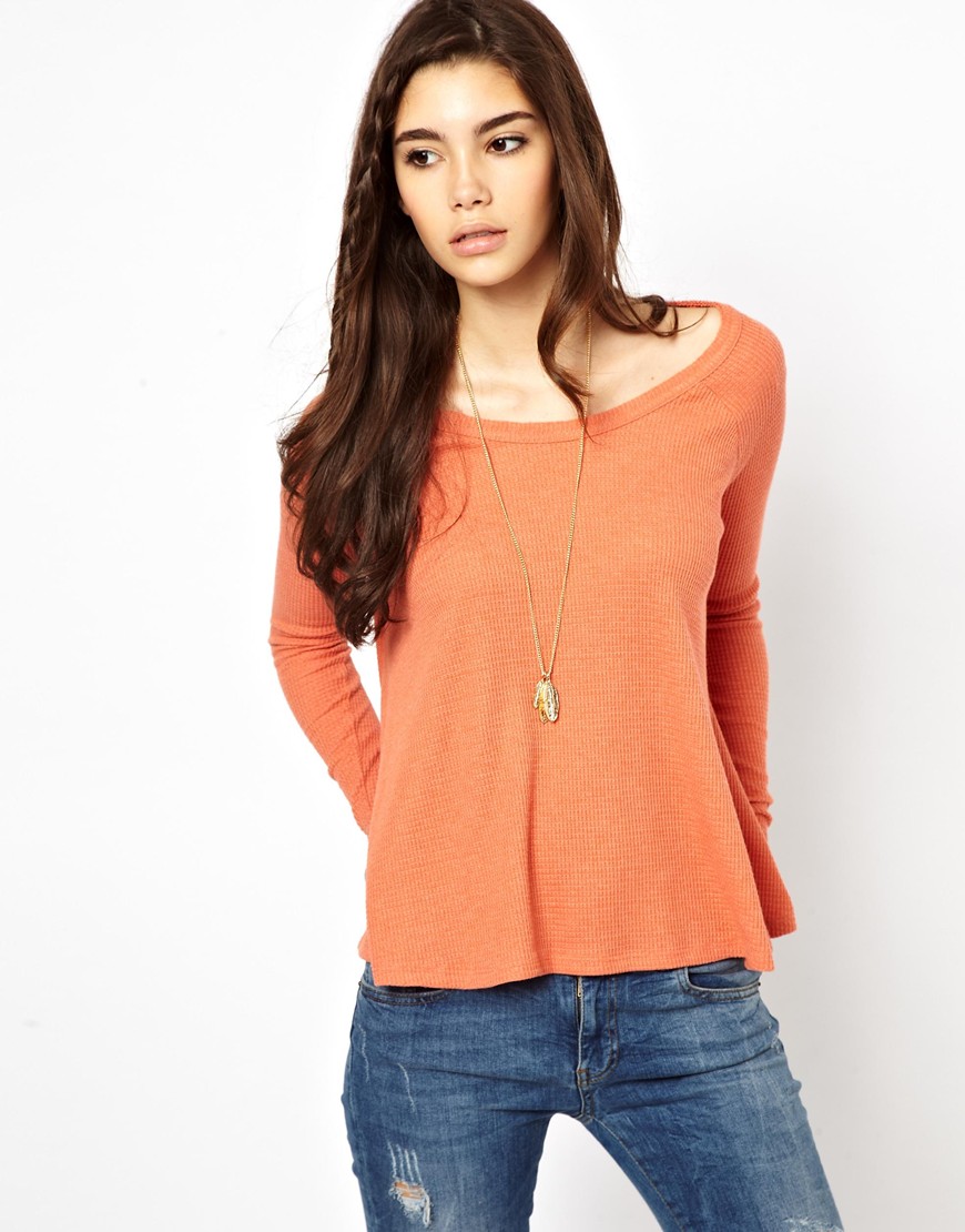 orange thermal top