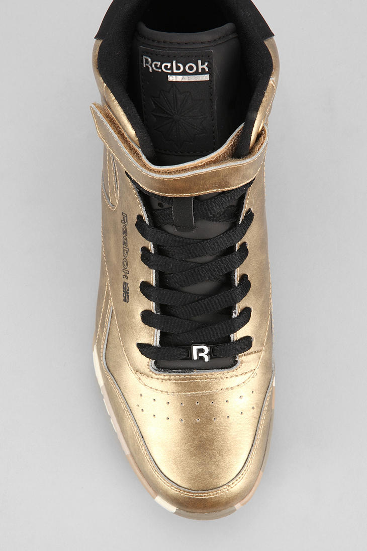 reebok high tops gold