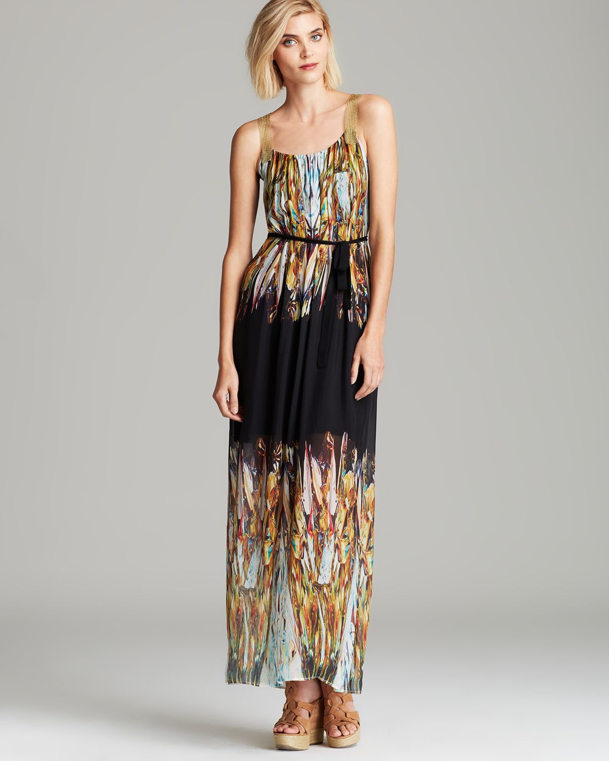 black dress with gold chain straps