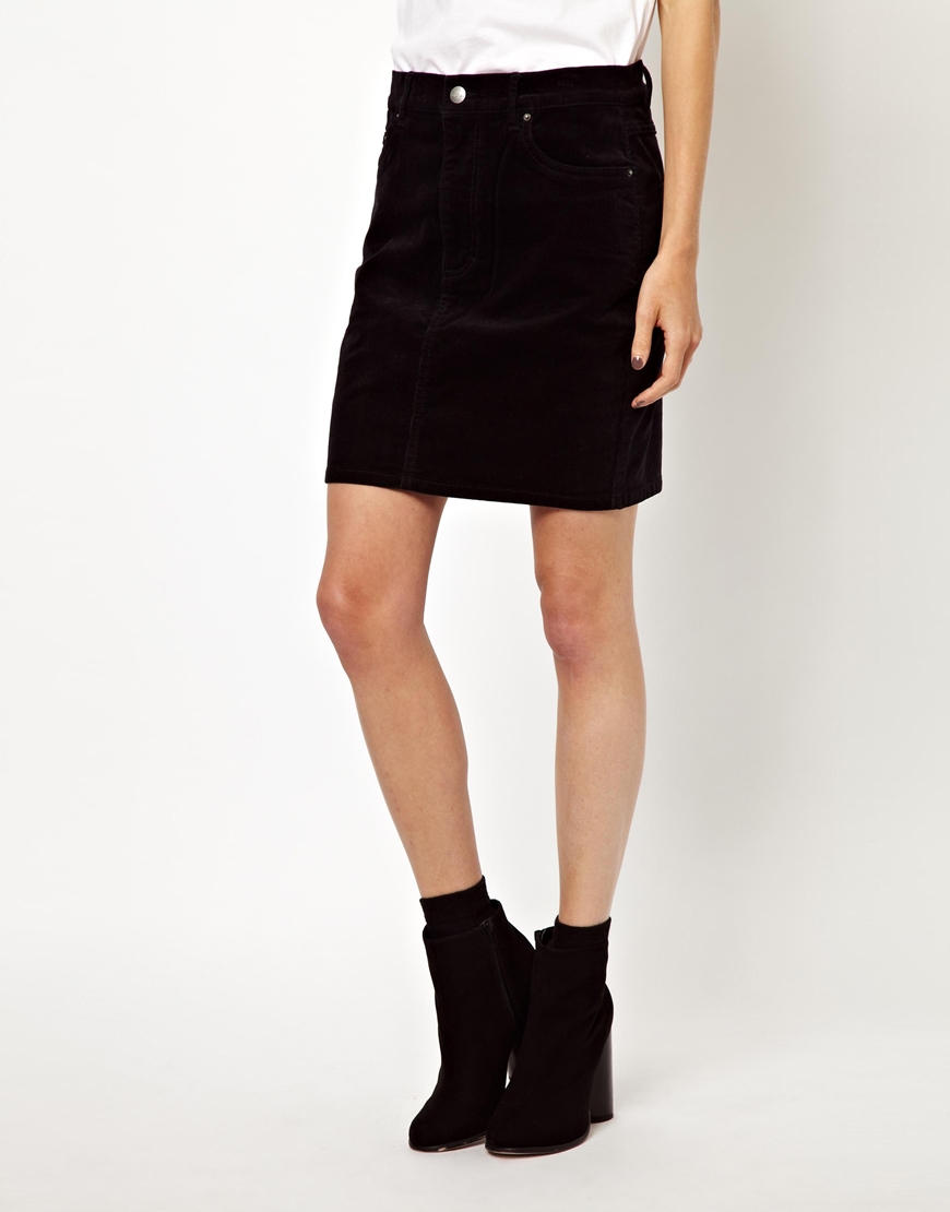 black cord knee length skirt