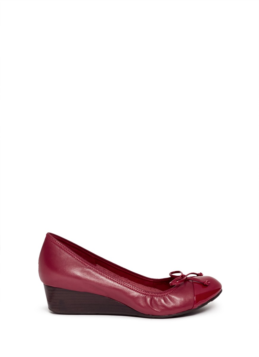 cole haan patent pumps