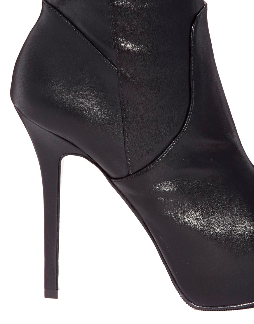 over the knee platform black boots