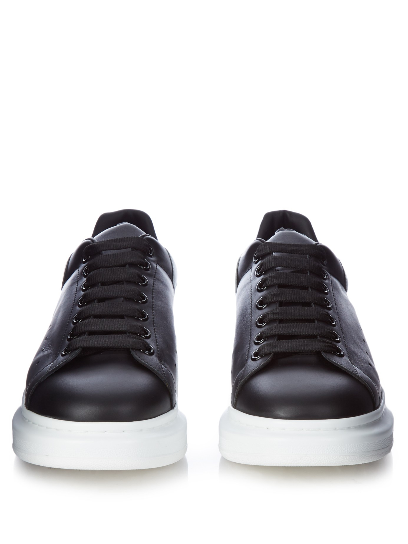black white sole trainers