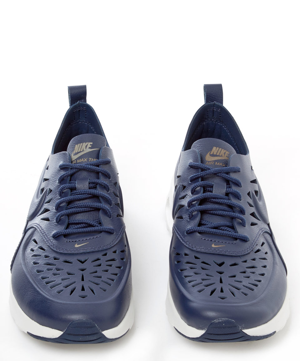 nike thea navy blue leather
