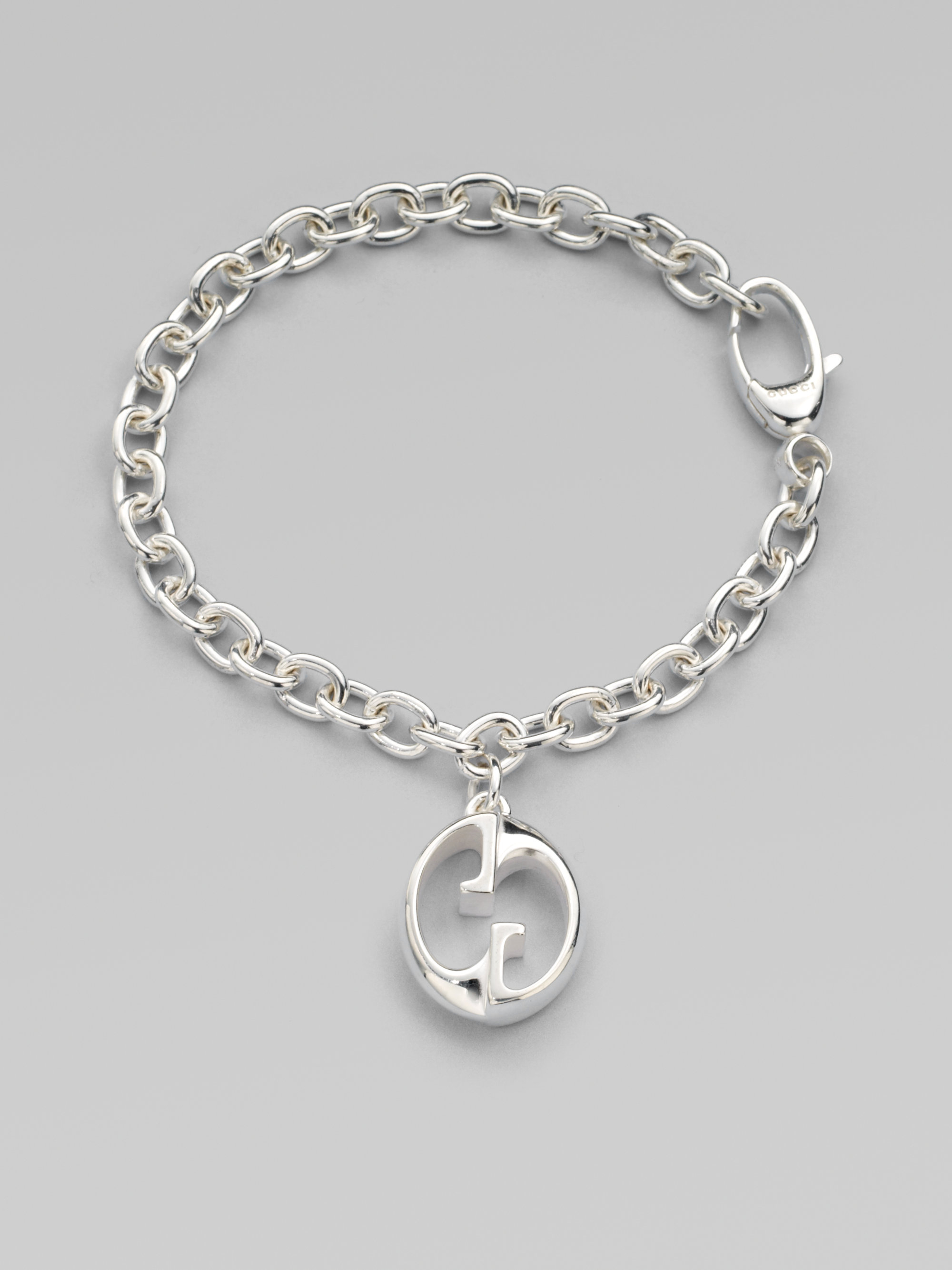 Gucci Sterling Silver 1973 Gg Charm Bracelet In Metallic - Lyst