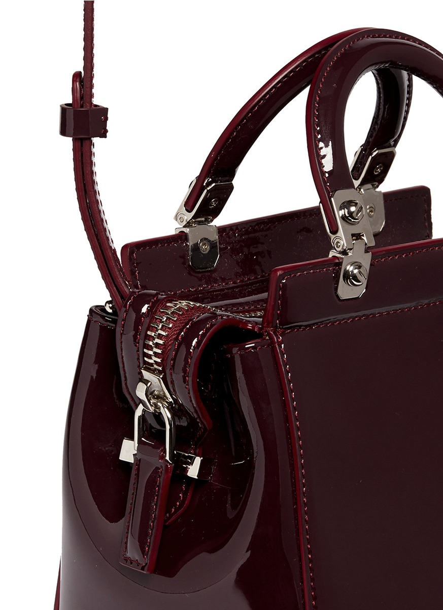 Leather Handbags With Zipper Closure Definition