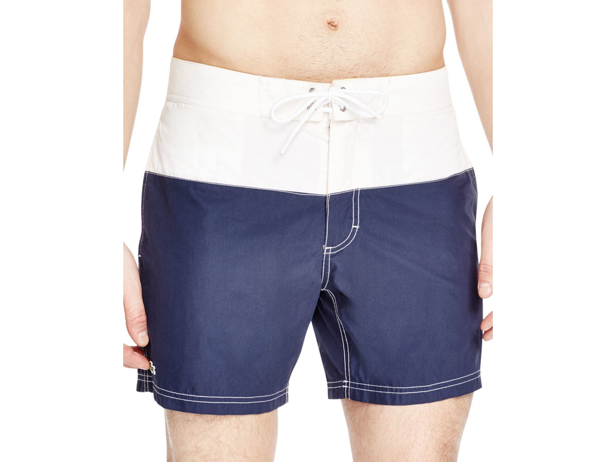 white lacoste swim shorts