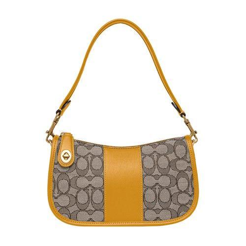 coach swinger bag in signature jacquard brown