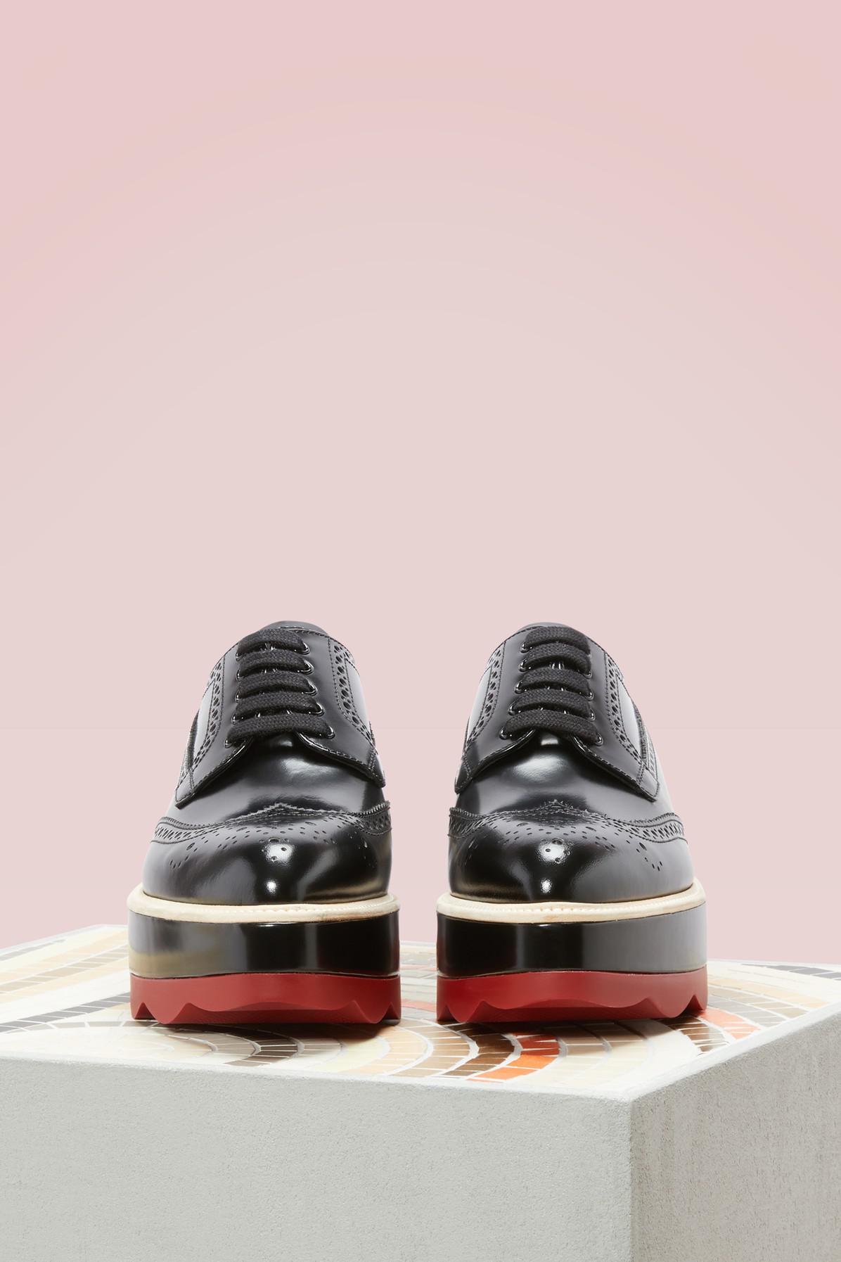 Prada Red Sole Derbies in Black