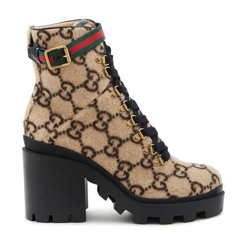 Leather ankle boot with belt gucci price hotsell