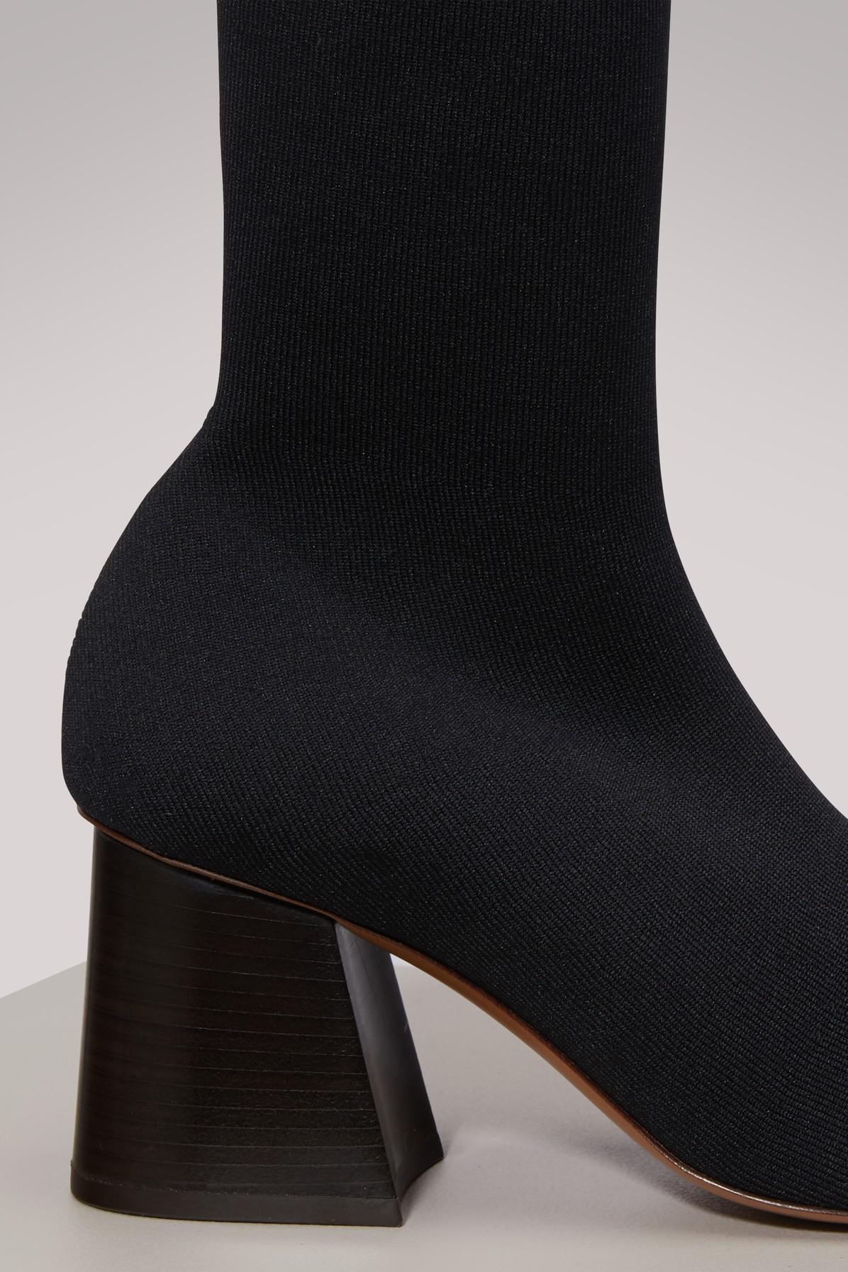 black fitted ankle boots
