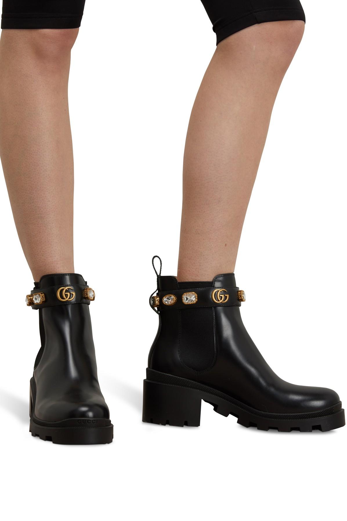 leather ankle boot with belt gucci