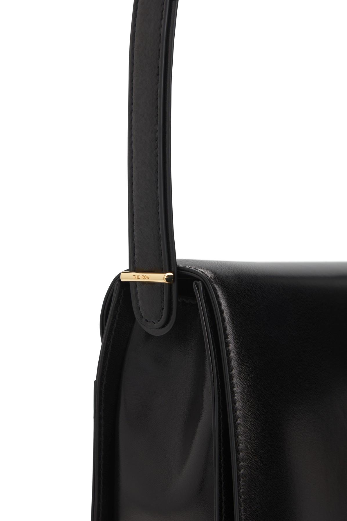 The Row, 90's black leather bag