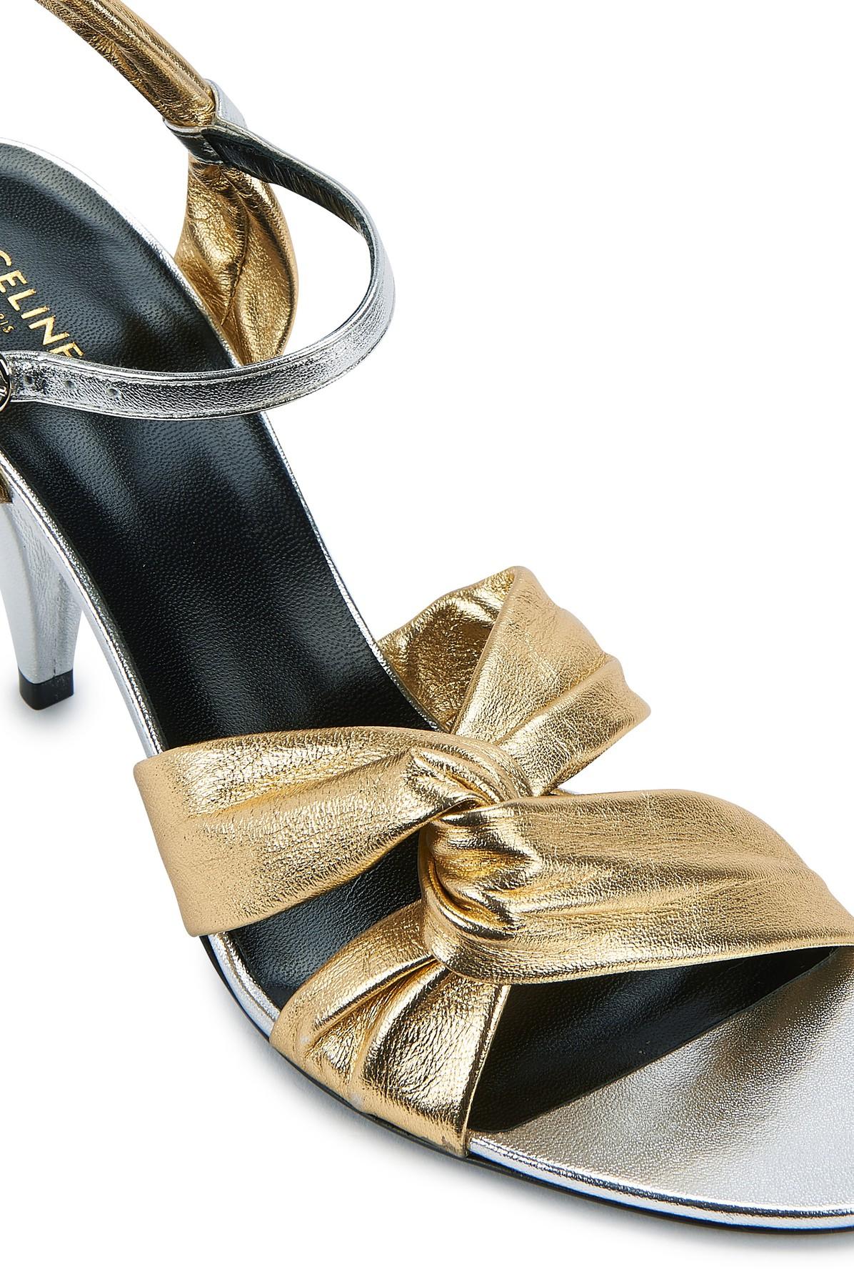 Celine Triangle Heel Twisted Sandal In Laminated Nappa Lambskin in Metallic  | Lyst