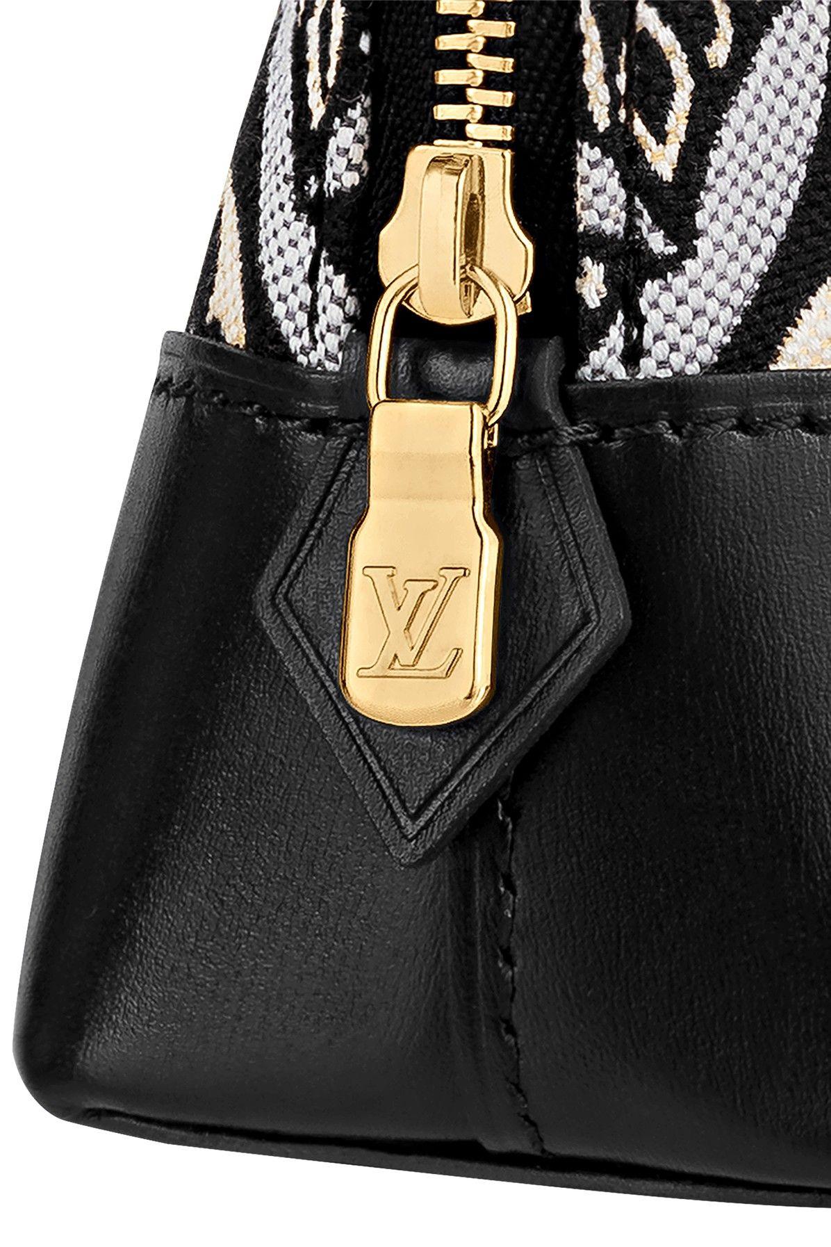 Louis Vuitton Womens Cosmetic Pouch Black / Beige Empreinte – Luxe  Collective