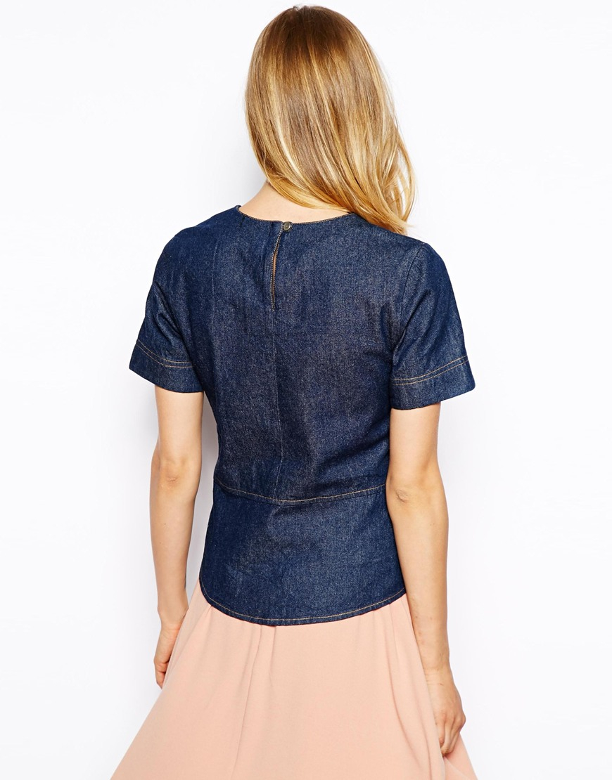 Your renewal didn't go through. A classic denim top with a trendy twist, this double-tiered peplum style is a serious score. From Joan Rivers Classics Collection®. Page /5(17).