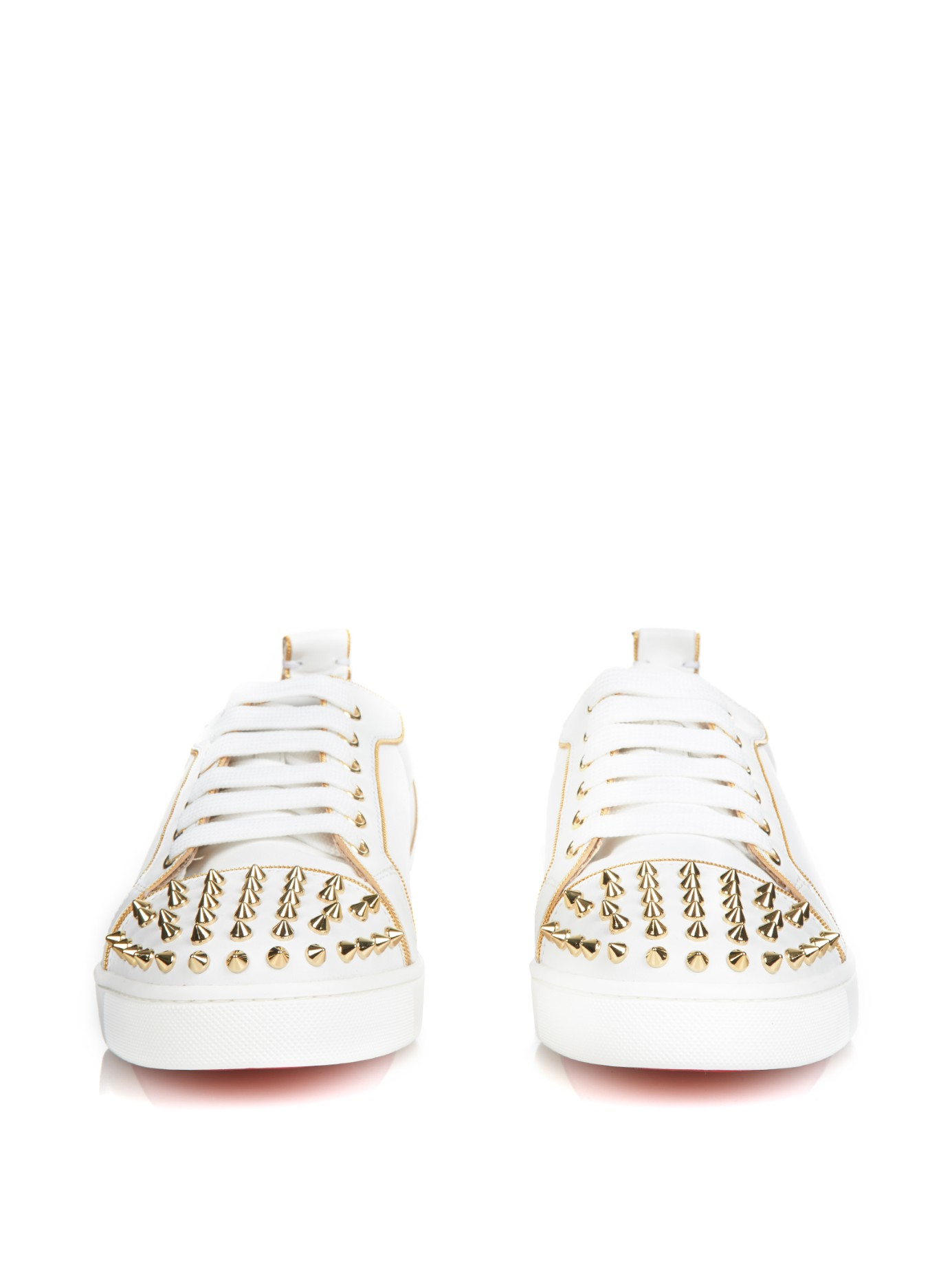 white and gold christian louboutin sneakers