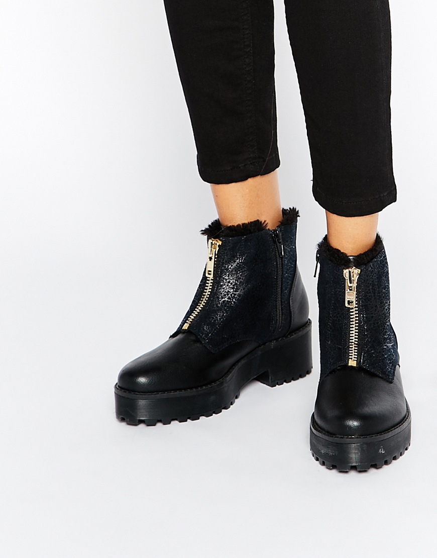 monki zip heeled platform boot in black