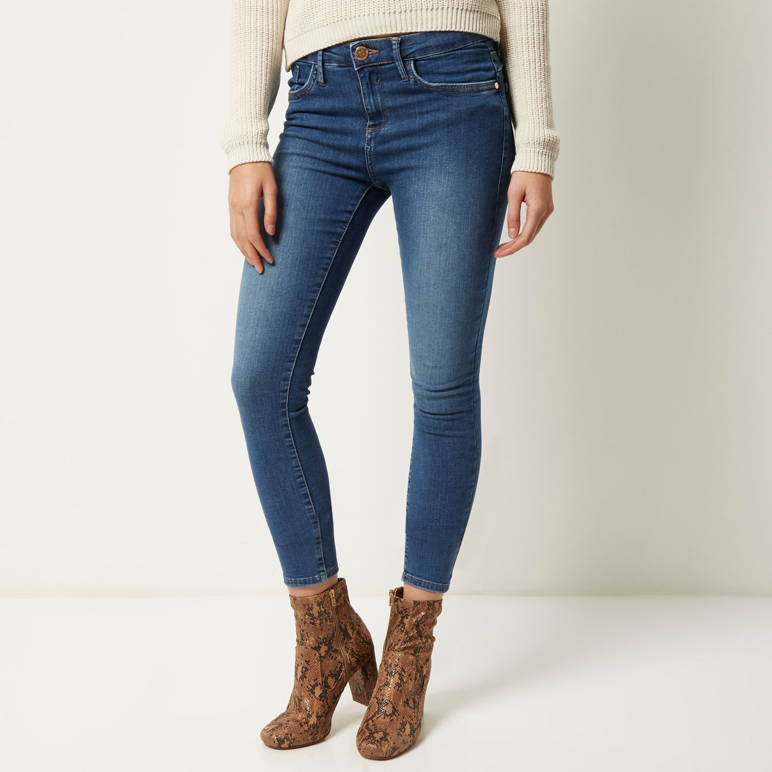 mid blue skinny jeans womens