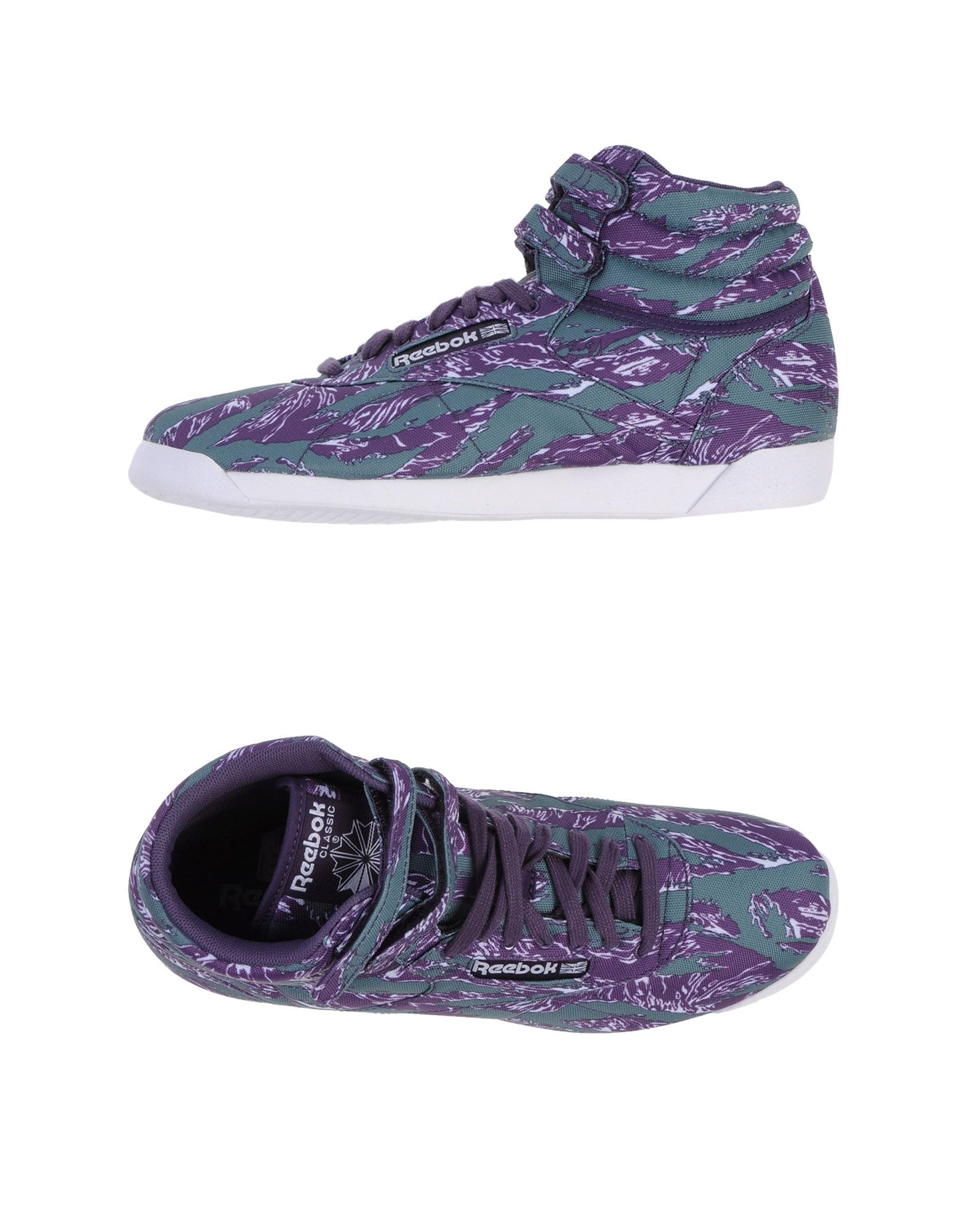 purple reebok high tops