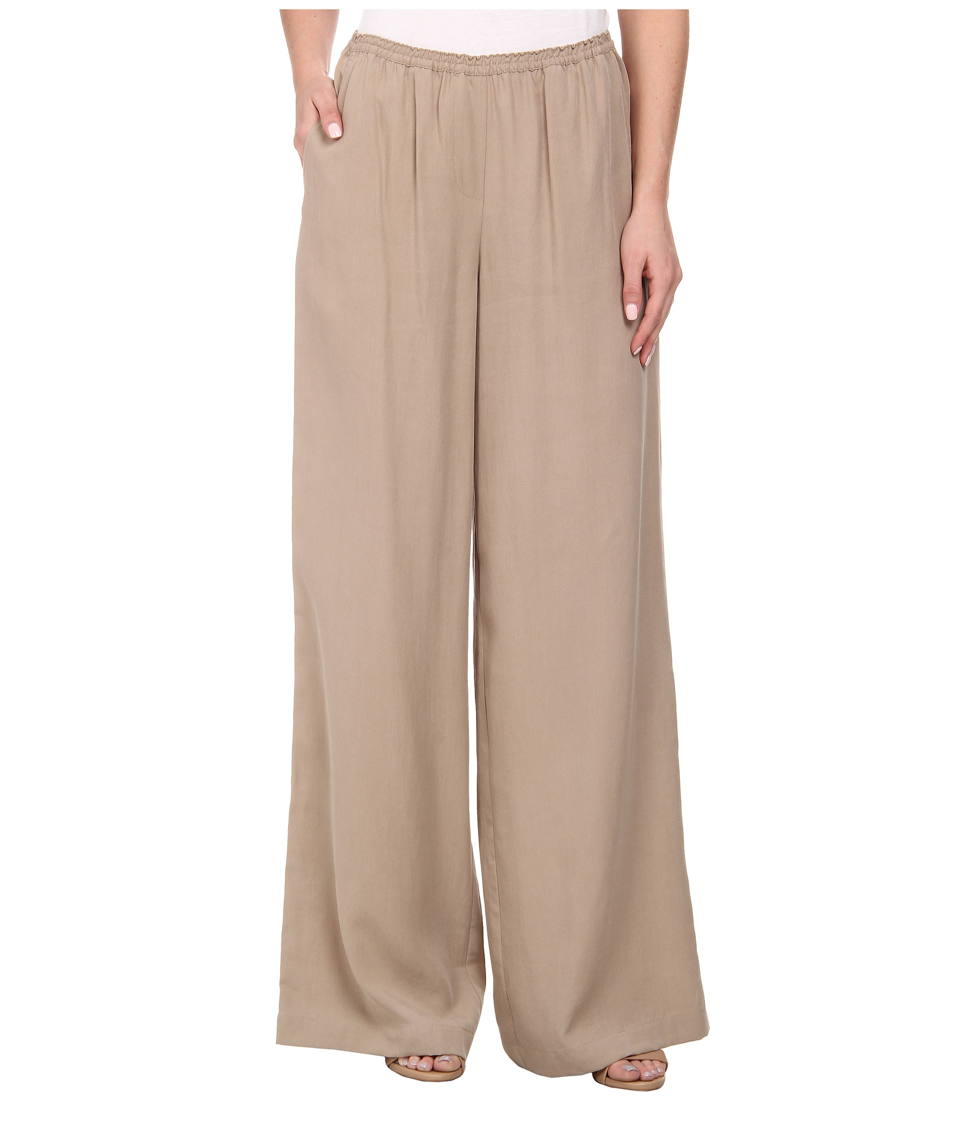 It's free shipping made easy Crepe Wide Leg Pants: Crafted from softly textured stretch crepe, these wide leg pants are relaxed through the hip and thigh for figure flattery and comfort. Fully lined for exceptional quality, these pants feature front darts, a fly front with double hook closure, belt .