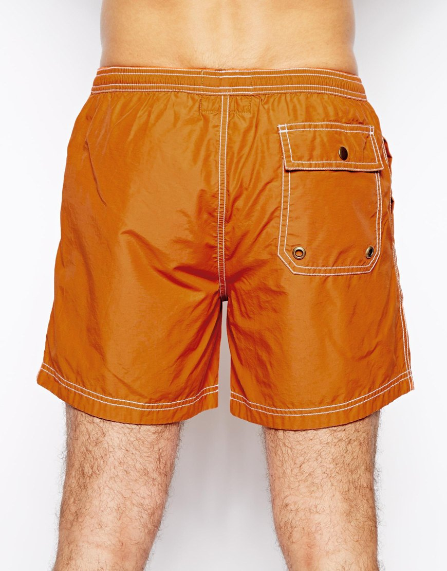 what to wear with burnt orange shorts for men