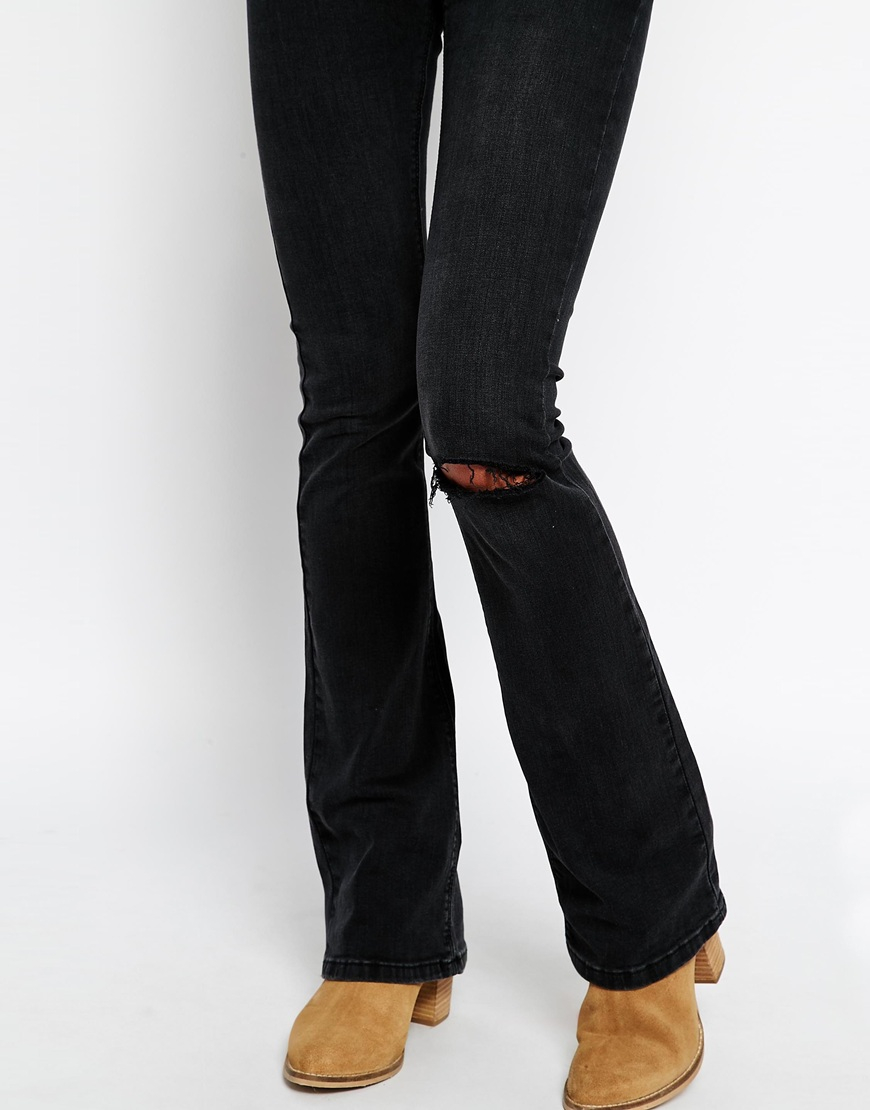 ripped knee flare jeans