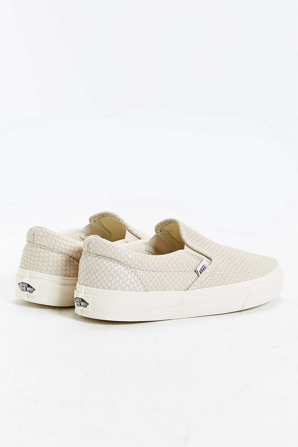 ivory slip on vans
